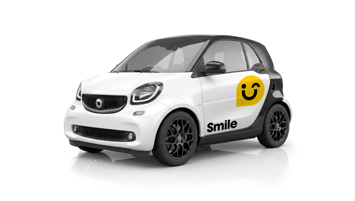 Smart Fortwo 453 with black rims on a white background