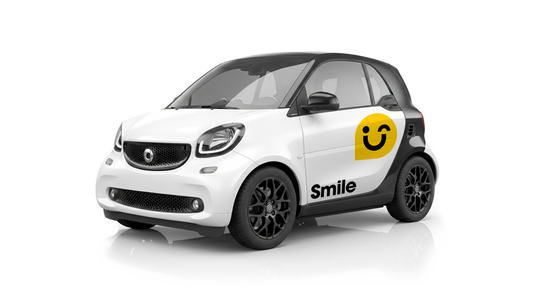 Smart Fortwo 453 with black rims on a white background